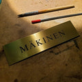 Messinkinen nimikilpi